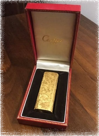 Mechero de alto lujo Cartier de oro en su caja que puede tasar aquí
